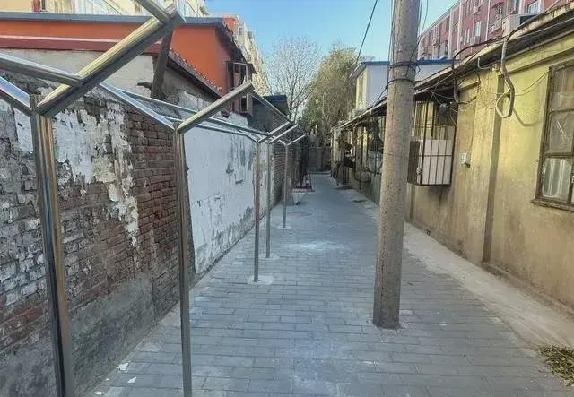 私搭乱建居民想提升小区环境的愿望实现了AG旗舰赞助马竞联赛拆除700平方米(图2)